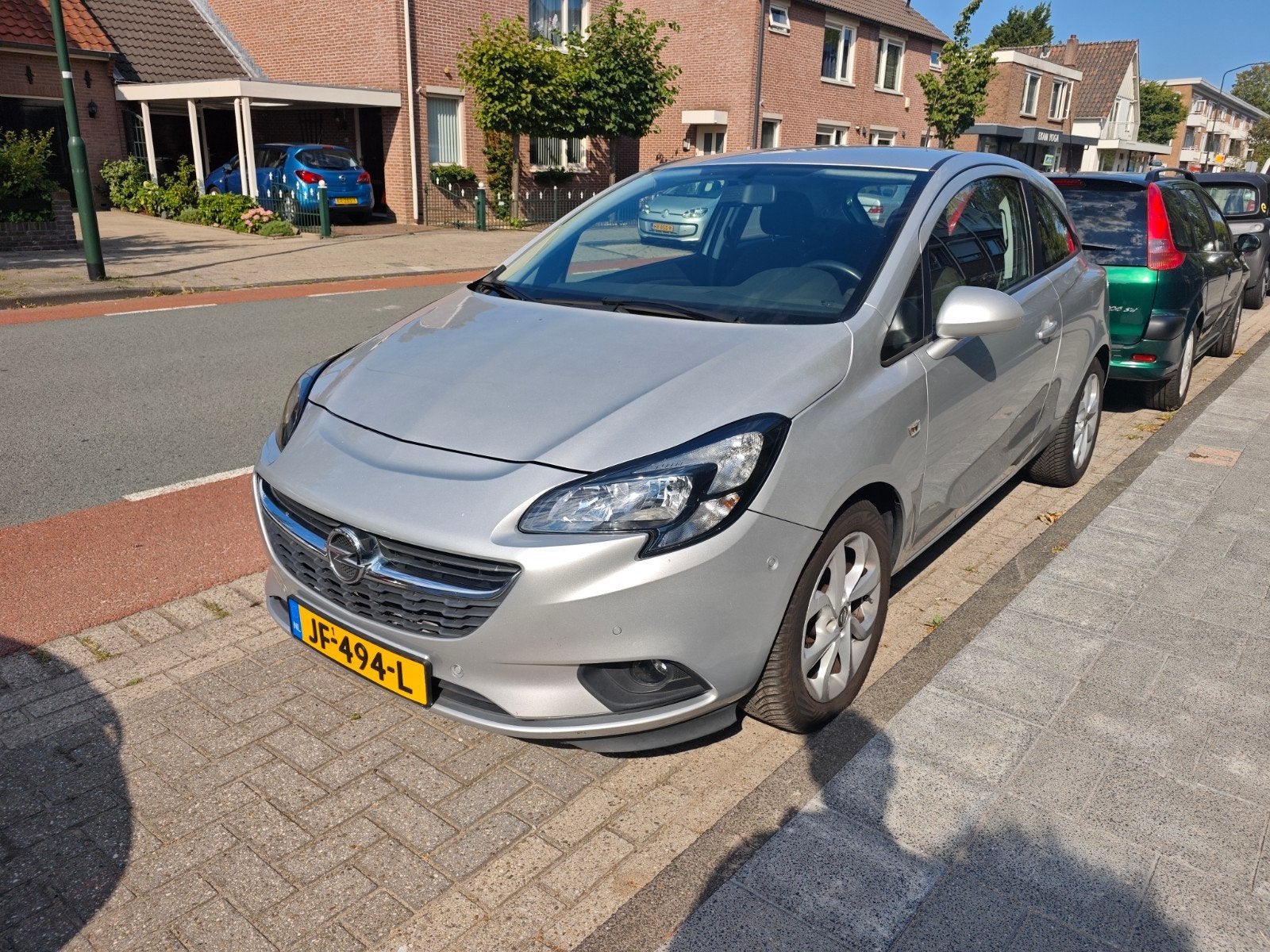 Opel Corsa 1.0T 66KW/90PK 3D 2016 Grijs, Auto's, Voorwielaandrijving, Zwart, Origineel Nederlands, 1200 kg