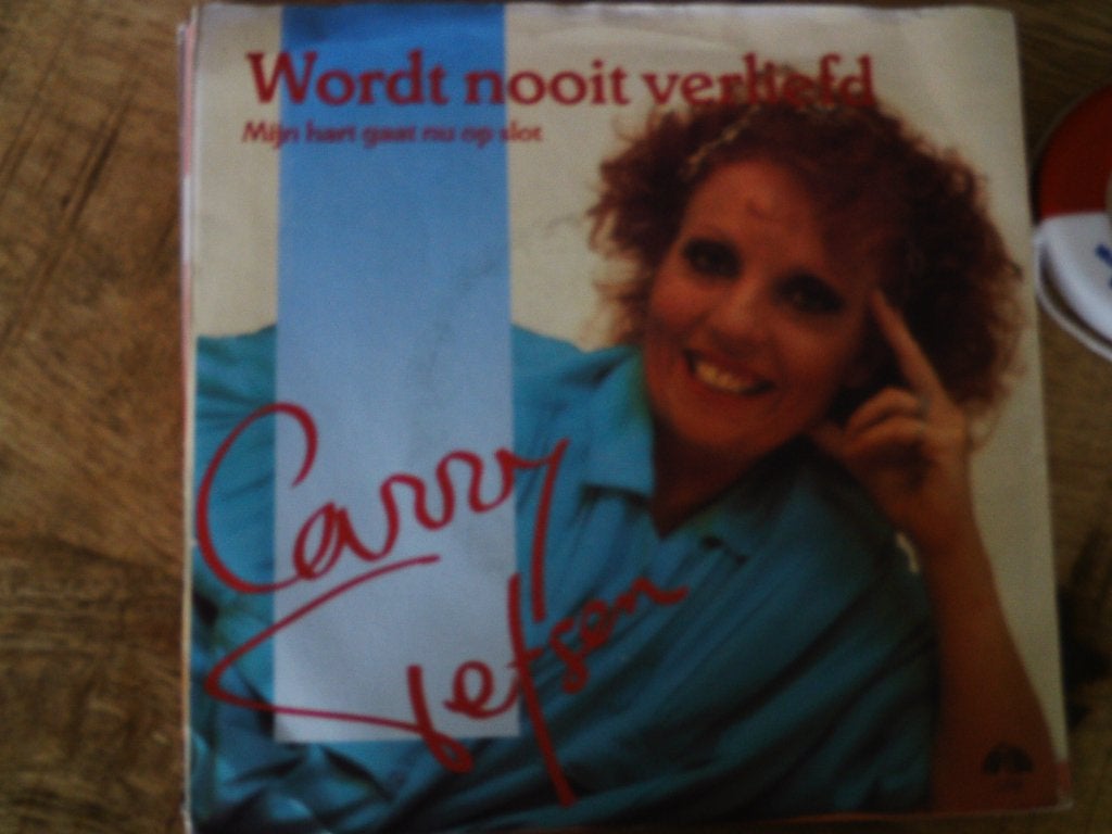 Carry Tefsen - Wordt nooit verliefd (Vinyl Single)  1s, 7 inch, Ophalen of Verzenden, Zo goed als nieuw, Fotohoes