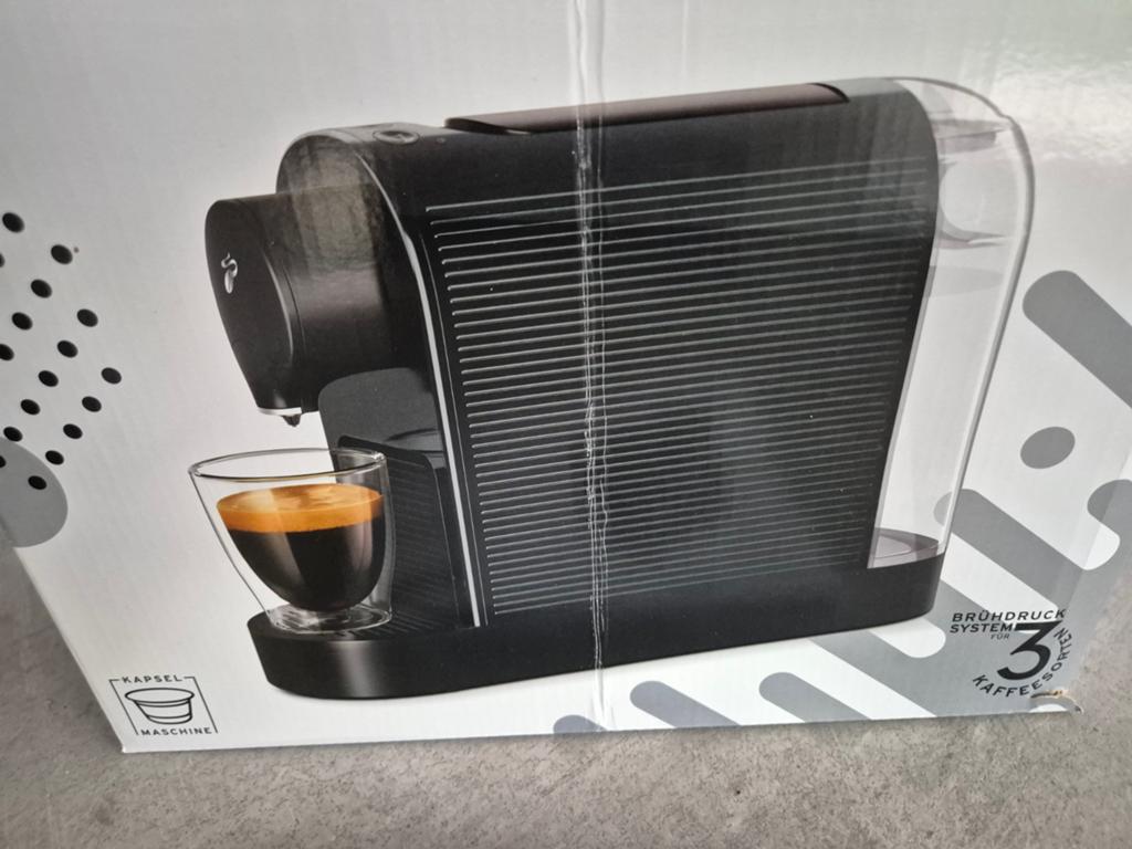 Tchibo Cafissimo Pure+ Black met 49 gratis capsules, Witgoed en Apparatuur, Koffiezetapparaten, Nieuw, Koffiepads en cups, Koffiemachine