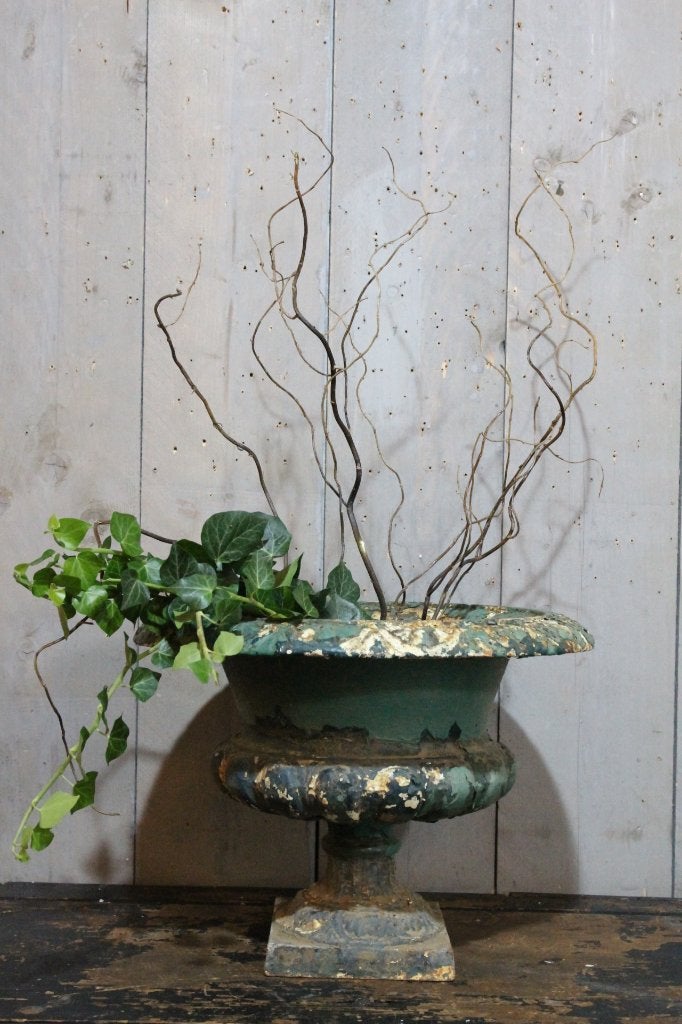 Antieke gietijzeren jardinière, Ophalen