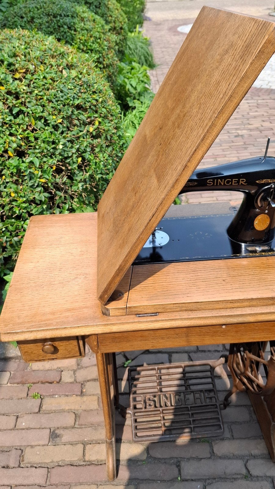 Vintage Singer trap naaimachine, Ophalen