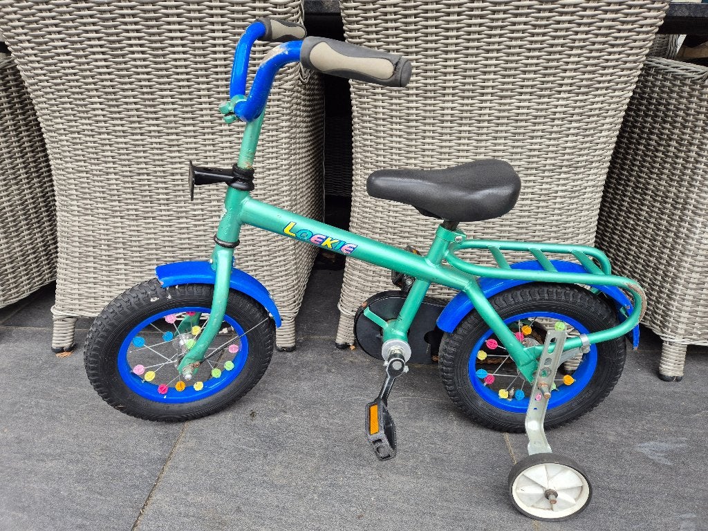 kinderfiets Loekie 12 inch, Fietsen en Brommers, Ophalen, Terugtraprem, Zijwieltjes, Gebruikt