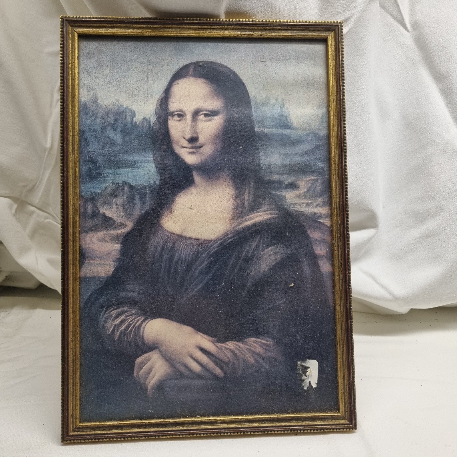 Mona Lisa reproductie in lijst, Ophalen
