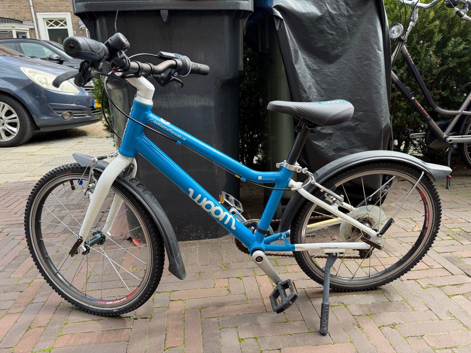 Woom 4 kinderfiets - Blauw - spatborden en standaard, Ophalen, Gebruikt, Velgrem, 20 inch of meer