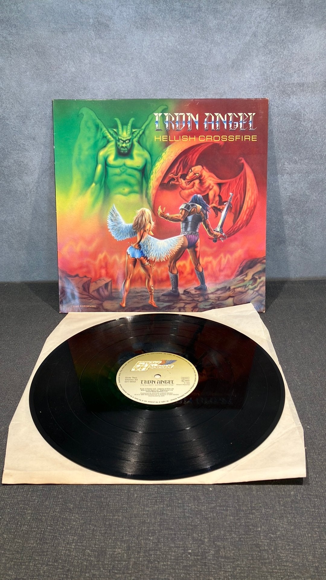 Iron Angel — Hellish Crossfire, 1980 - 1989, Ophalen of Verzenden, Zo goed als nieuw, Inclusief binnenhoes