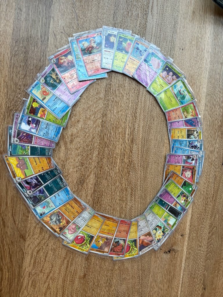 Pokemon Scarlet en Violet 151 verschillende reverse kaarten.