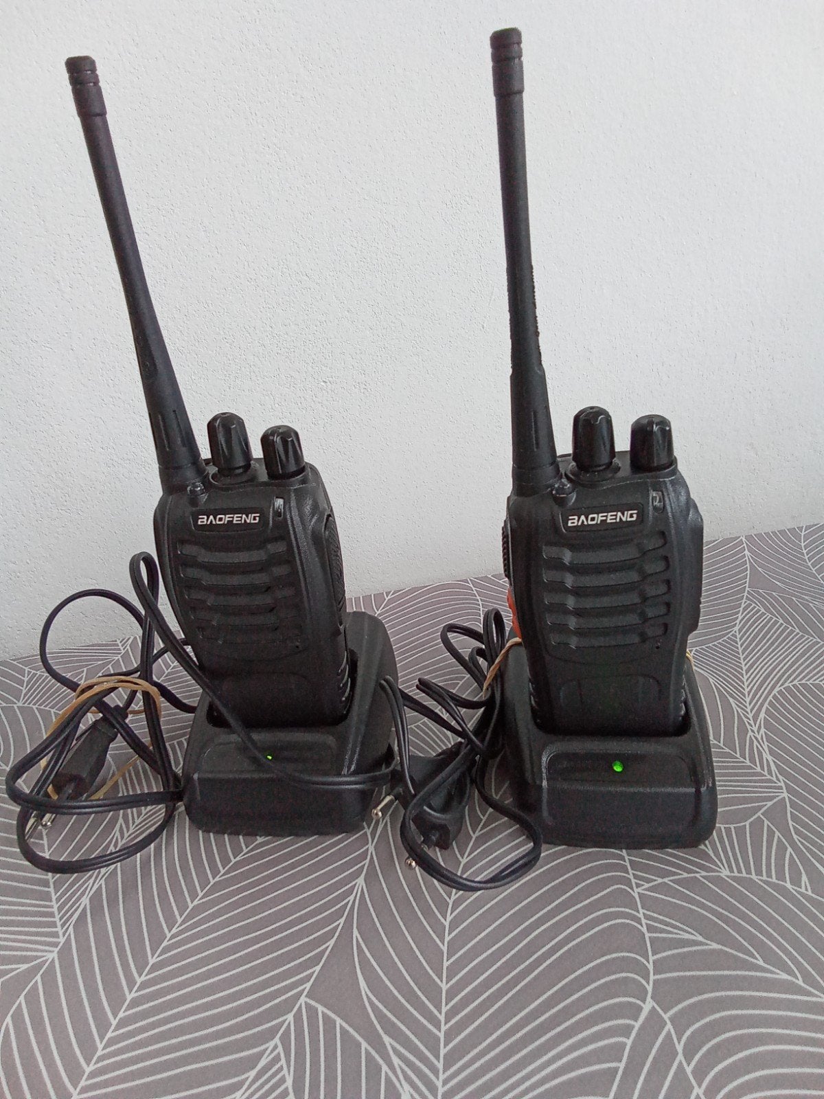 2 walkie talkies, Ophalen
