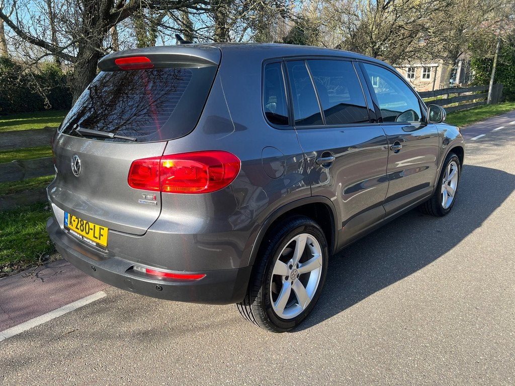Volkswagen Tiguan 1.4 TSI Comfort&Design Edition Clima PDC, Auto's, Voorwielaandrijving, Euro 5, Gebruikt, Zwart