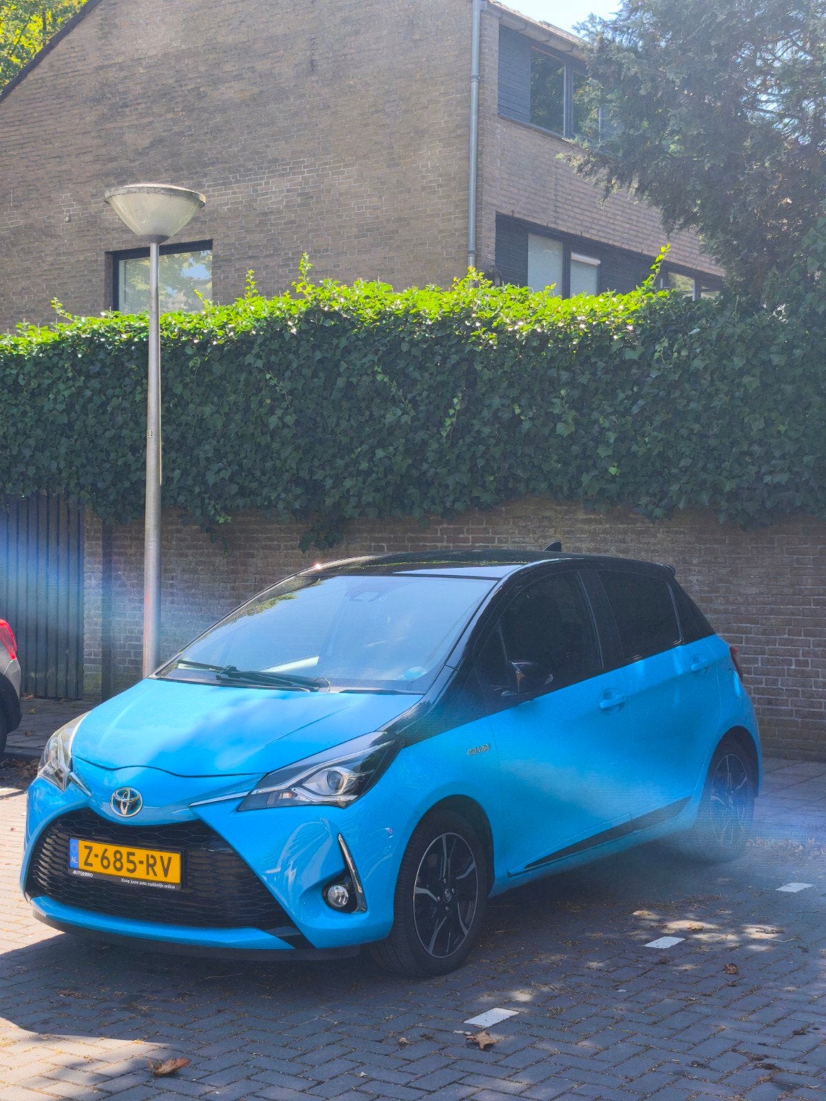 Toyota Yaris 1.5 Hybrid 100pk 5D CVT 2018 Blauw, Auto's, 1497 cc, Blauw, 49 €/maand, Yaris