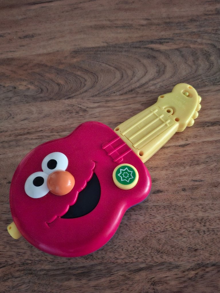 Leuke gitaar van elmo, Ophalen of Verzenden, Nieuw, Overige typen, Met geluid