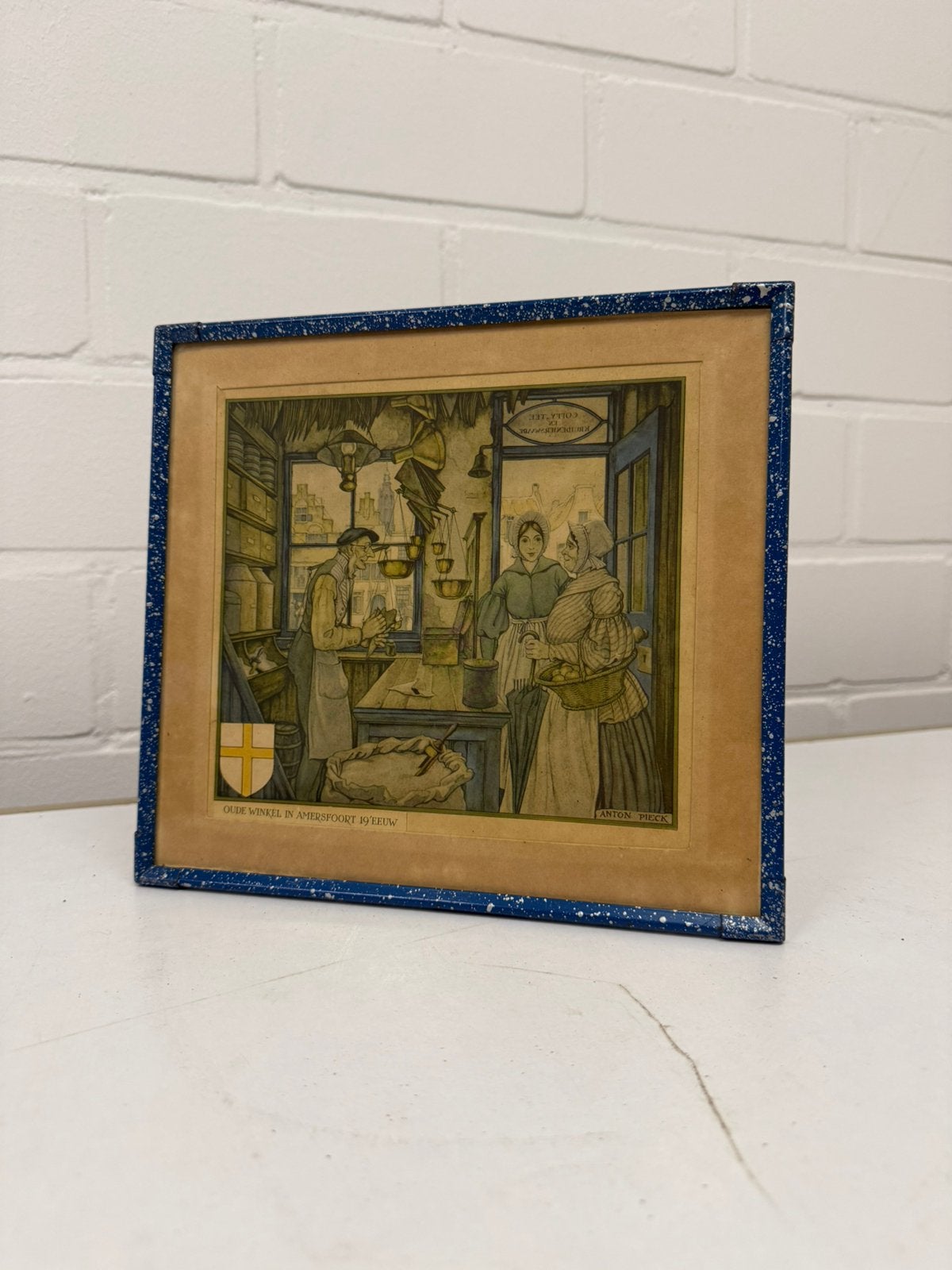 Anton Pieck prent prentje in lijst oude winkel amersfoort, Ophalen of Verzenden