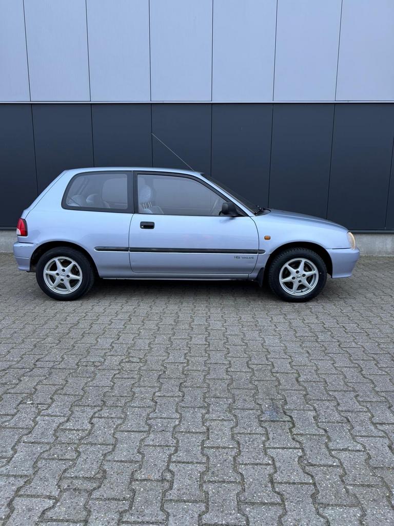 Daihatsu Charade 1.3 I 16V AUT 1996 Grijs, Auto's, Daihatsu, 4 cilinders, 400 kg, Origineel Nederlands, Radio