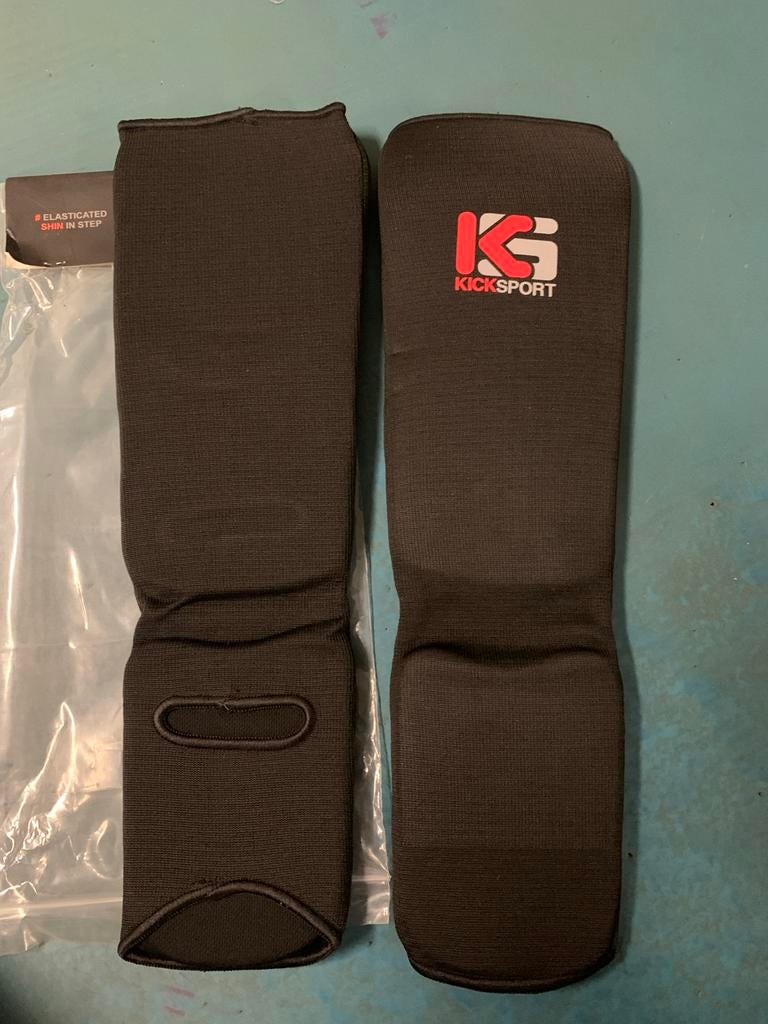 Nieuwe beenbeschermers maat L - Kickboks bescherming, Sport en Fitness, Vechtsporten en Zelfverdediging, Nieuw, Overige, Vechtsportbescherming