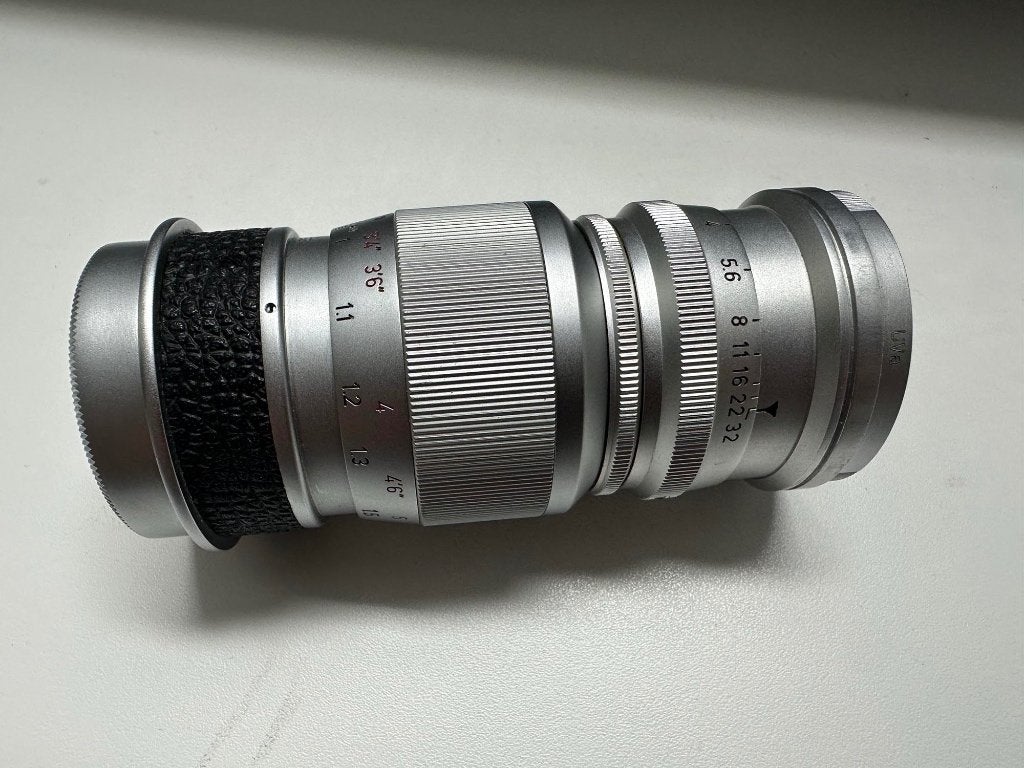 Leitz Leica Elmar f4 90mm lens, met UV filter - schroef, Ophalen of Verzenden, Zo goed als nieuw, Telelens