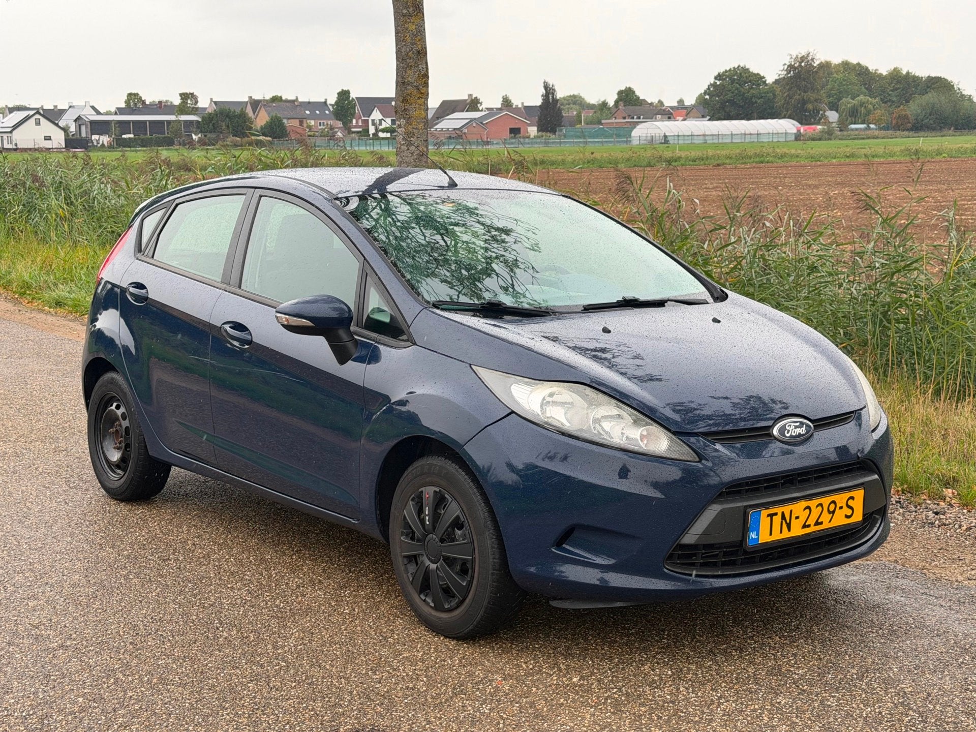 Ford Fiesta 1.25 Ghia 5 Drs APK 09-2026 Airco, Voorwielaandrijving, Euro 5, Stof, Bedrijf