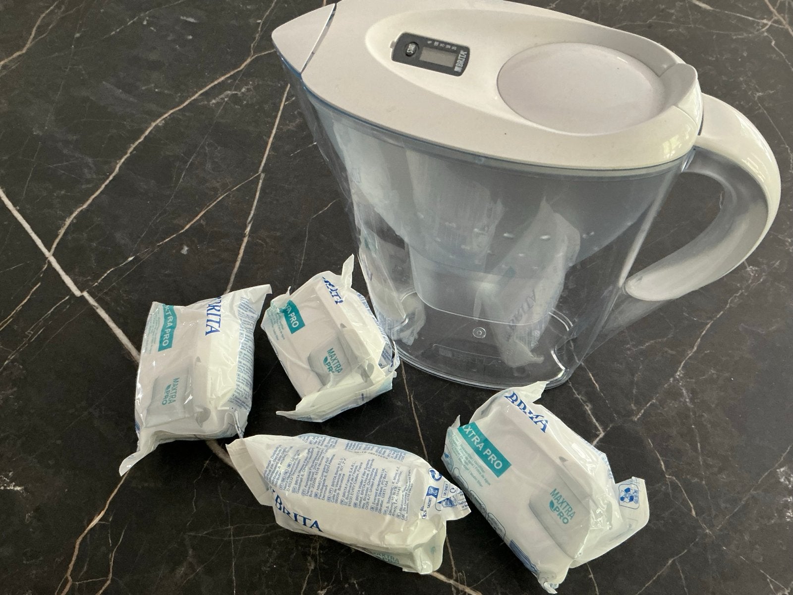 BRITA waterfilterkan met 4 originele filters, Ophalen, Zo goed als nieuw