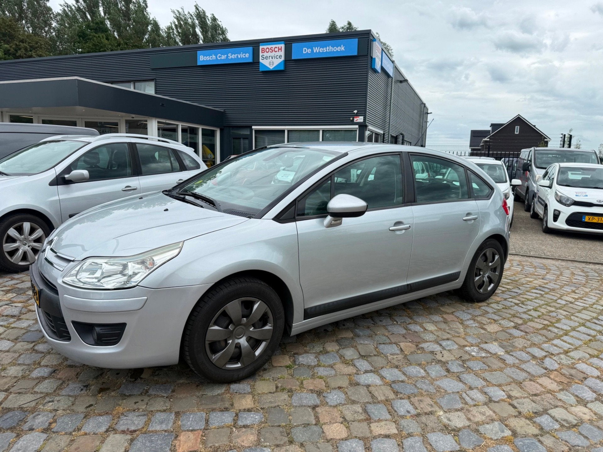 Citroen C4 1.6 VTi Anniversaire, Auto's, Gebruikt, Parkeersensor, 4 cilinders, Bedrijf