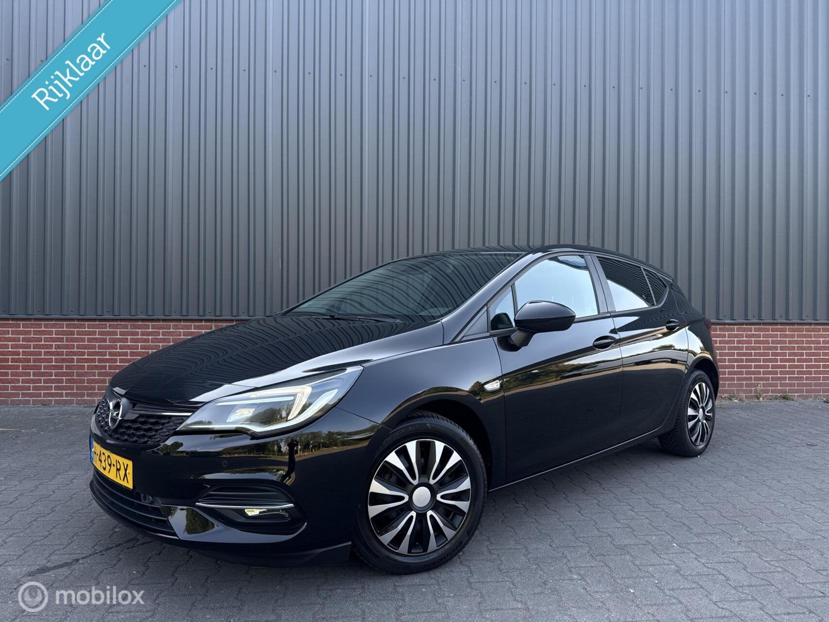 Opel Astra 1.2 Business Executive Cruise Led Carplay NL Auto, Voorwielaandrijving, Stof, Gebruikt, 1199 cc