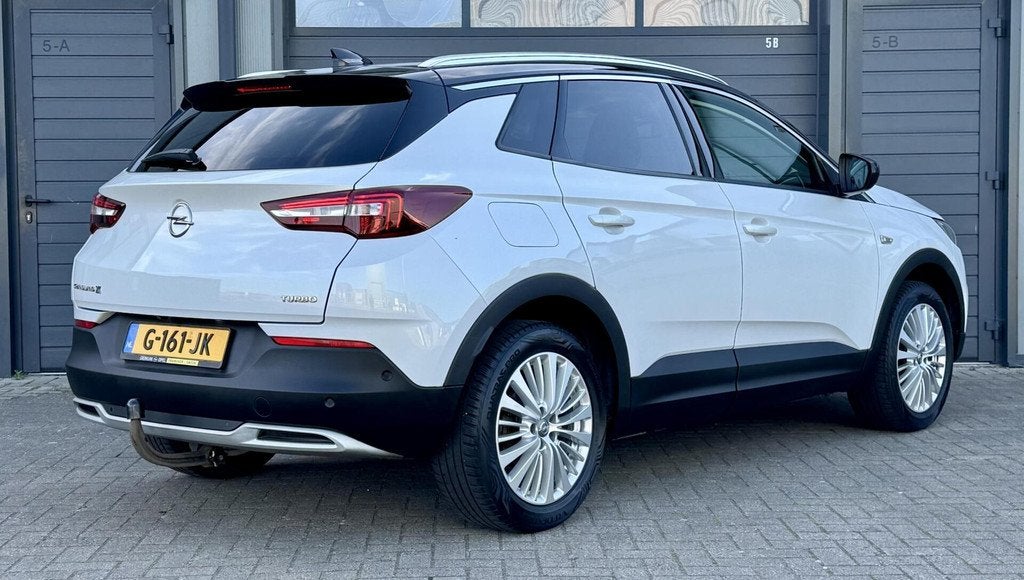 Opel Grandland X 1.2 - 130pk Turbo | ZEER COMPLEET | AUTOMAA, Gebruikt, 1199 cc, Leder en Stof, Wit
