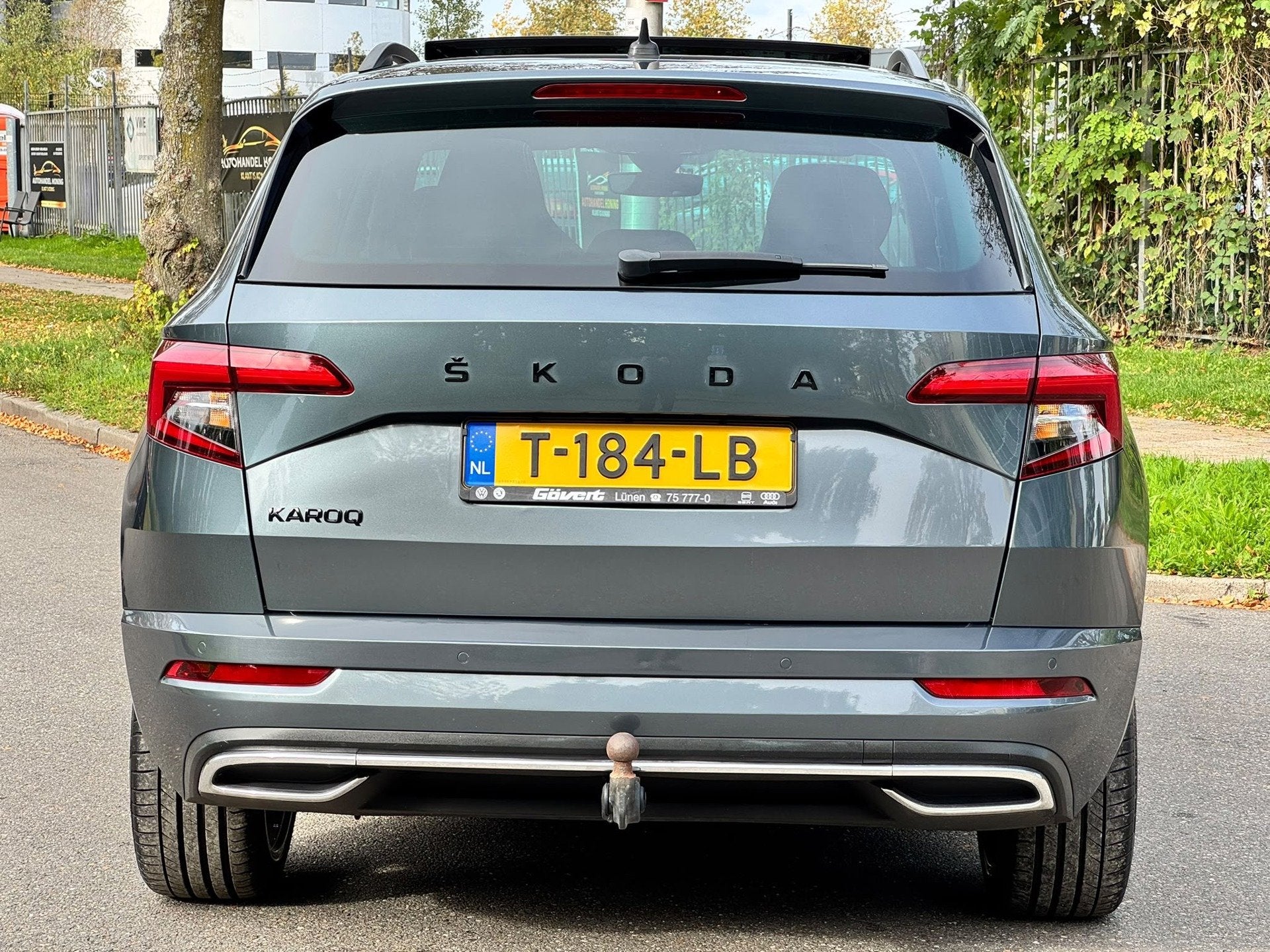 Skoda Karoq 2.0 TSI 4x4 Sportline Business, Auto's, Automaat, Gebruikt, Euro 6, 1984 cc