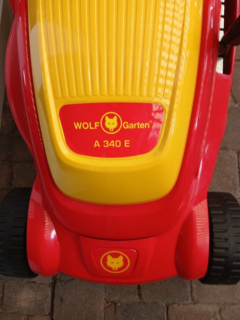 wolf340e   grasmaaier   1 x gebruikt     te groot., Ophalen, Cirkelmaaier, Elektrische grasmaaier, Nieuw