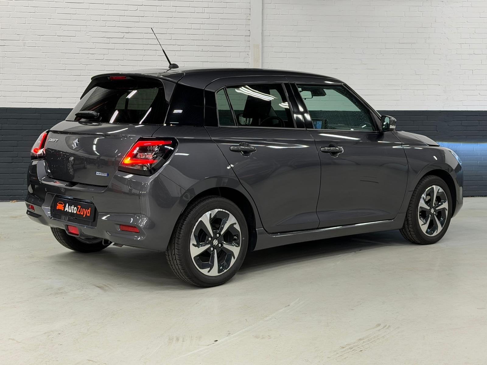 Suzuki Swift 1.2 Comfort Smart Hybrid / Camera / Navi / Carp, Voorwielaandrijving, 83 pk, Stof, Gebruikt