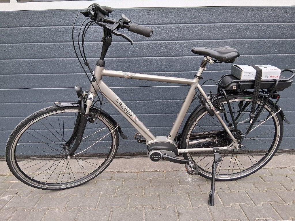 Gazelle Orange met Bosch middenmotor. framemaat 57. 400Wh, 55 tot 59 cm, Ophalen, Gebruikt, Gazelle