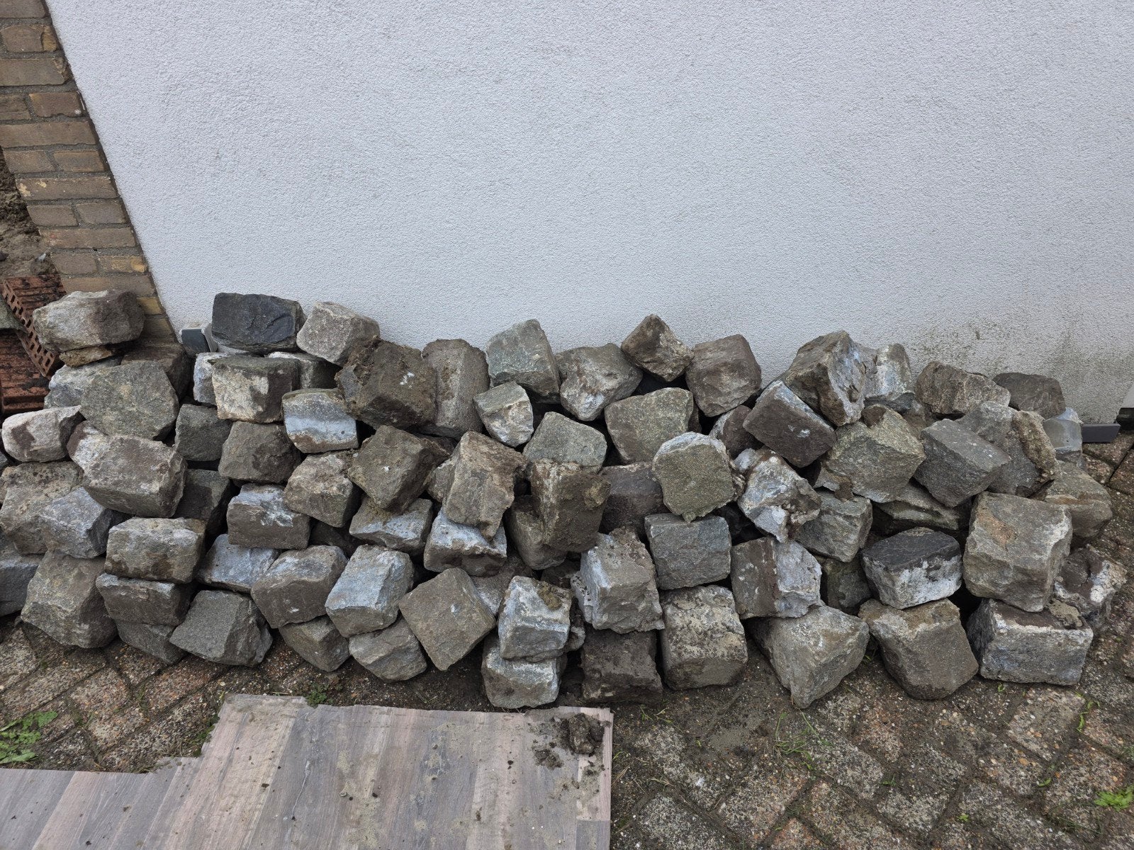 Gebruikte kasseien, kinderkopjes voor tuin of oprit, Tuin en Terras, Ophalen, Gebruikt, Graniet, Kei