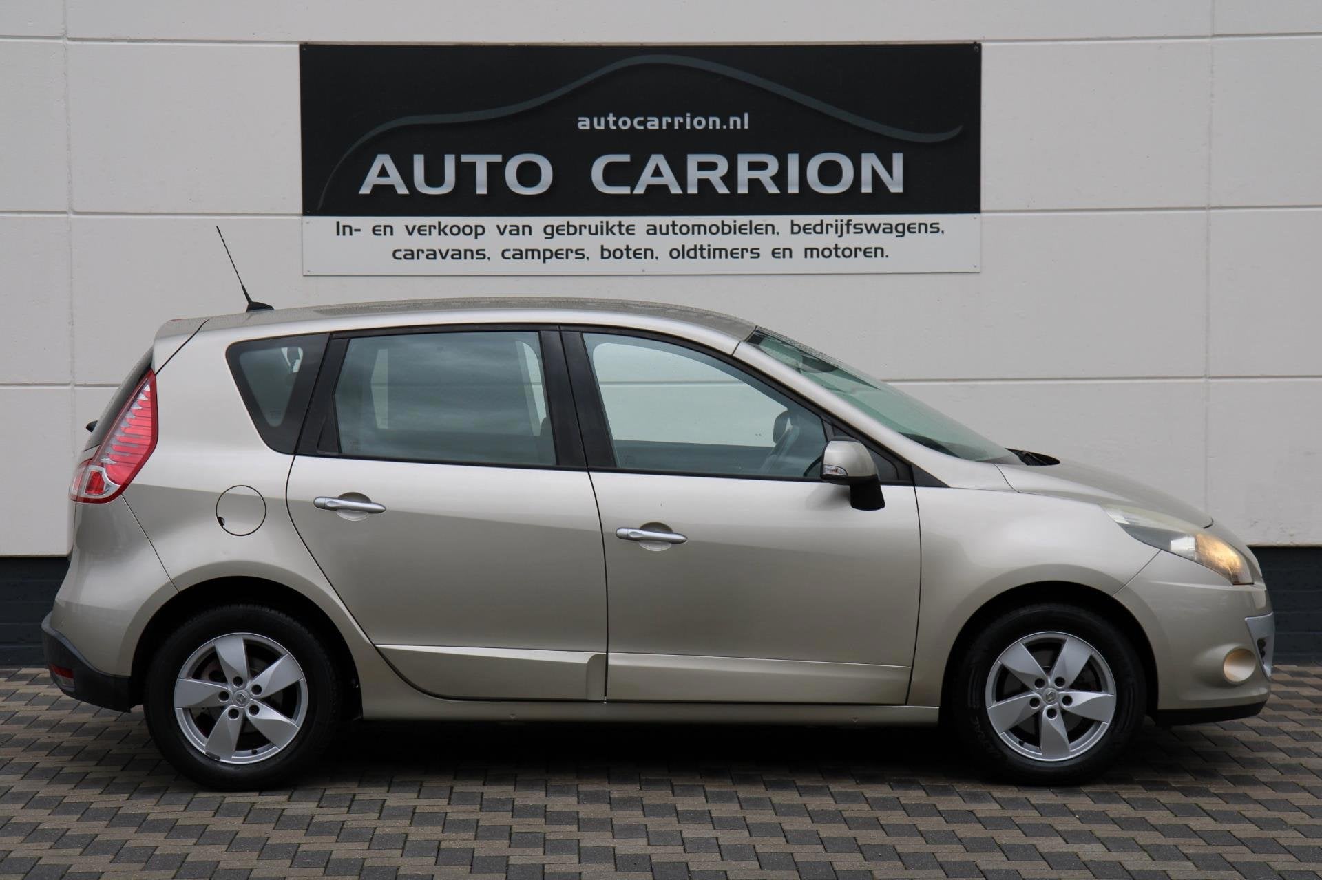 Renault Scénic 2.0 140PK Dynamique Airco Cruise Navi NAP AP, Auto's, Renault, Zwart, 4 cilinders, Leder en Stof, Beige