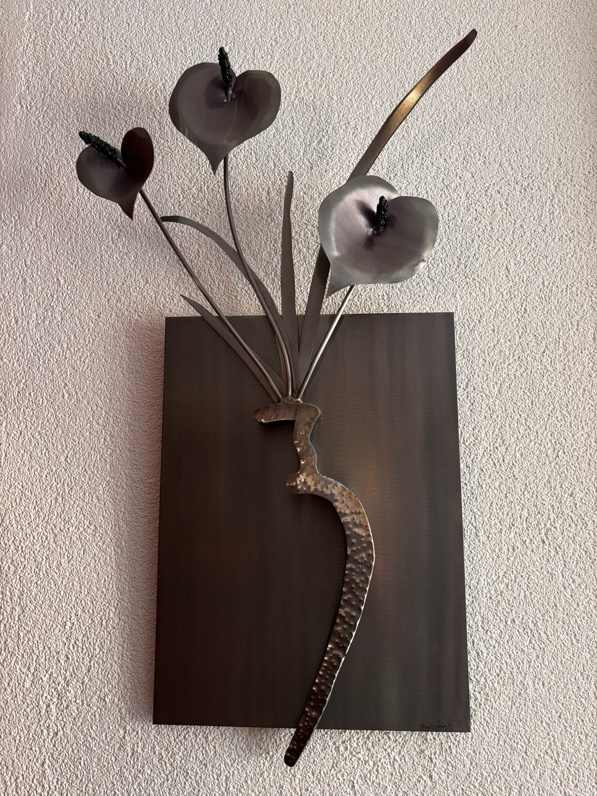 Metalen wanddecoratie met bloemmotief, Ophalen