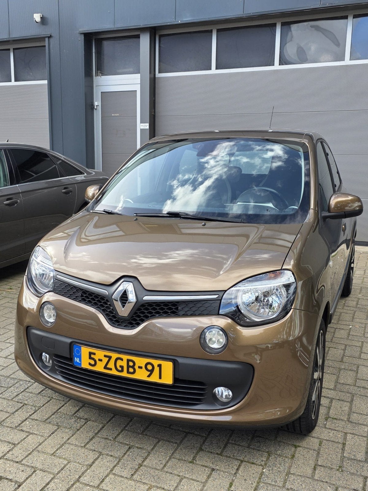 Renault Twingo 1.0 SCe 70pk S&S 2015 Bruin, Auto's, 4 stoelen, Origineel Nederlands, Handgeschakeld, 70 pk