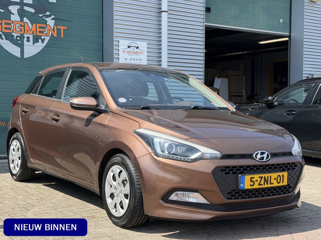 Hyundai i20 1.2 HP i-Motion Comfort / Cruise / Clima / NAP, Auto's, Hyundai, 4 cilinders, Bruin, Origineel Nederlands, Bedrijf