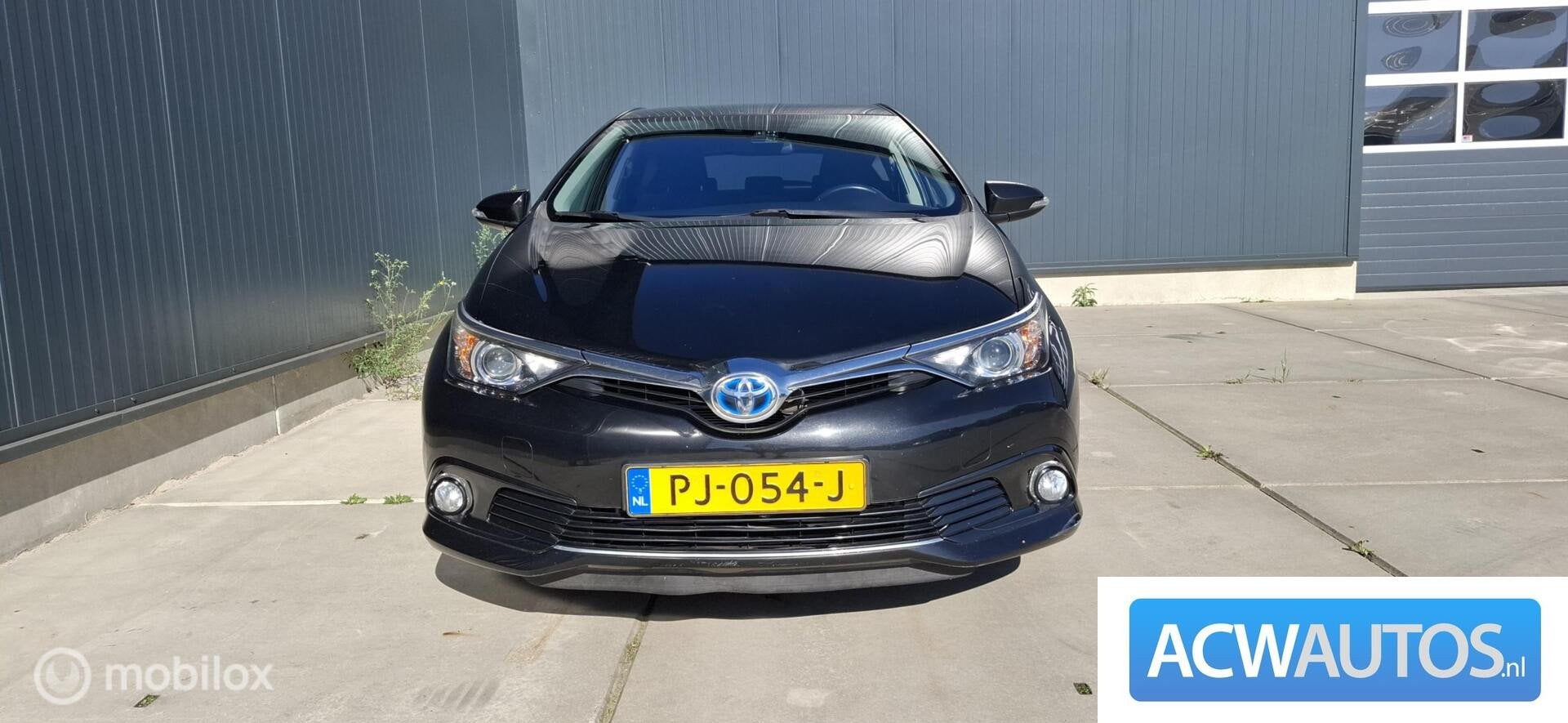 Toyota Auris 1.8 Hybrid Black Edition, Auto's, Gebruikt, Euro 6, 4 cilinders, Zwart