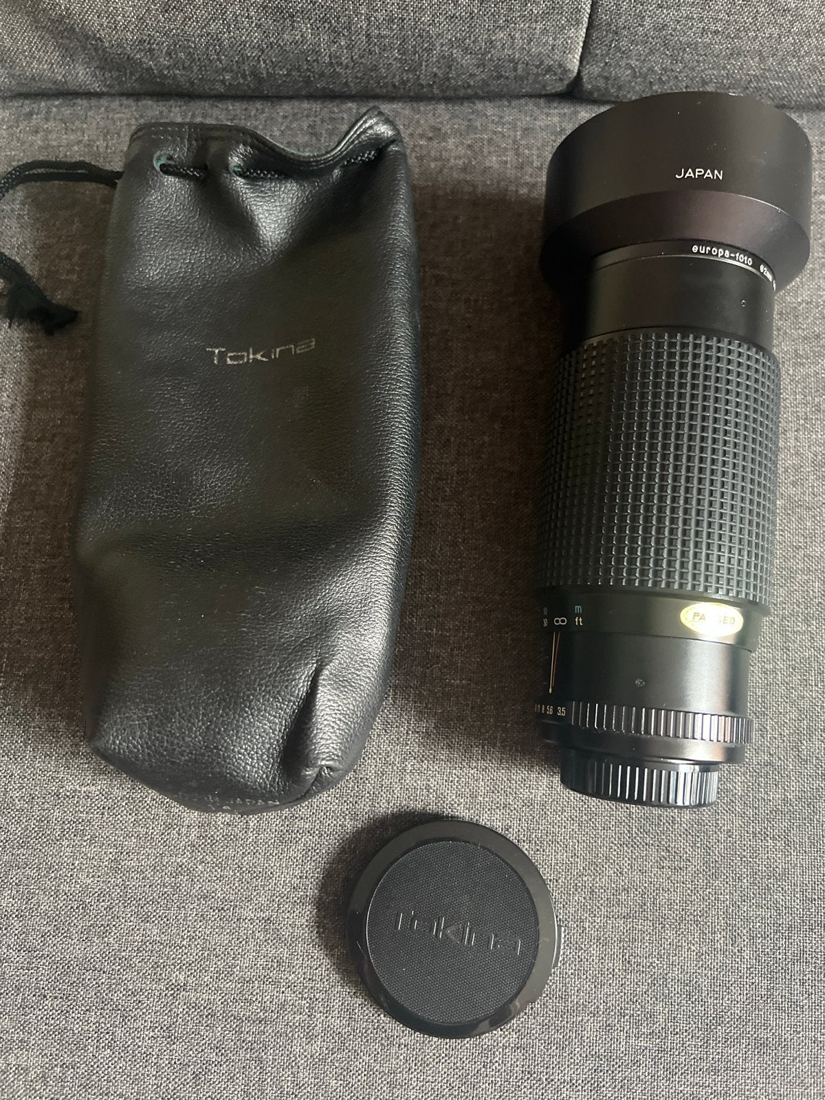 Tokina 70-210mm f/3.5 zoomlens met zonnekap en hoes, Ophalen, Gebruikt, Tokina, Beschermhoes/tas