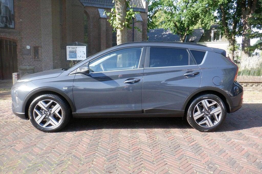 Hyundai Bayon 1.0 T-GDI 48V 100PK 7DCT-CAMERA- Comfort Smart, Auto's, Hyundai, 12 maanden, Gebruikt, 1110 kg, Bedrijf