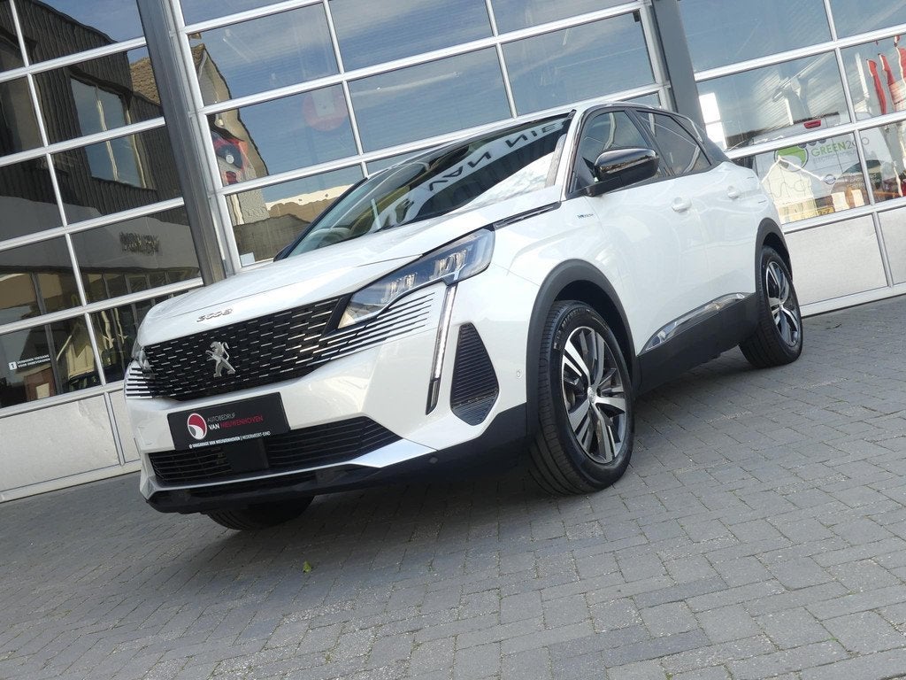 Peugeot 3008 HYbrid4 300 e-EAT8 Allure *t/m 10de bouwjaar ga, Auto's, Peugeot, Automaat, 4 cilinders, Met garantie (alle), Leder en Stof
