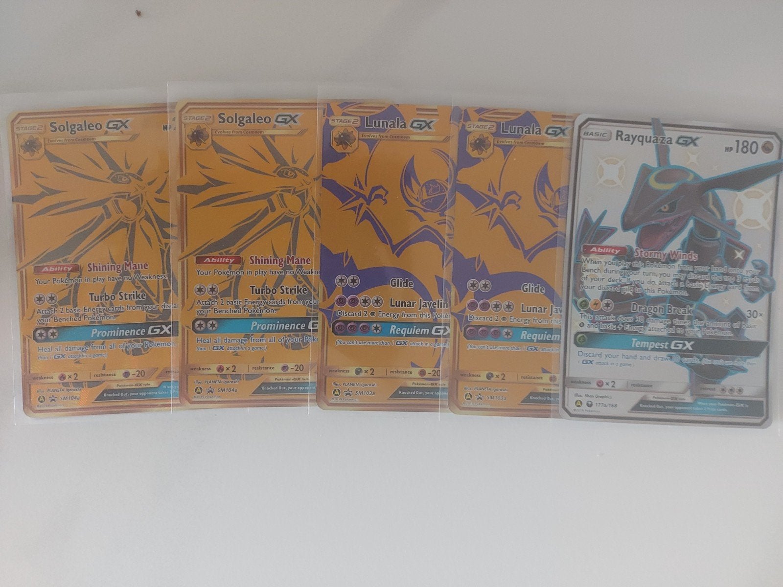 Pokémon GX Kaarten: Rayquaza, Lunala, Solgaleo, Ophalen of Verzenden, Zo goed als nieuw, Meerdere kaarten, Foil