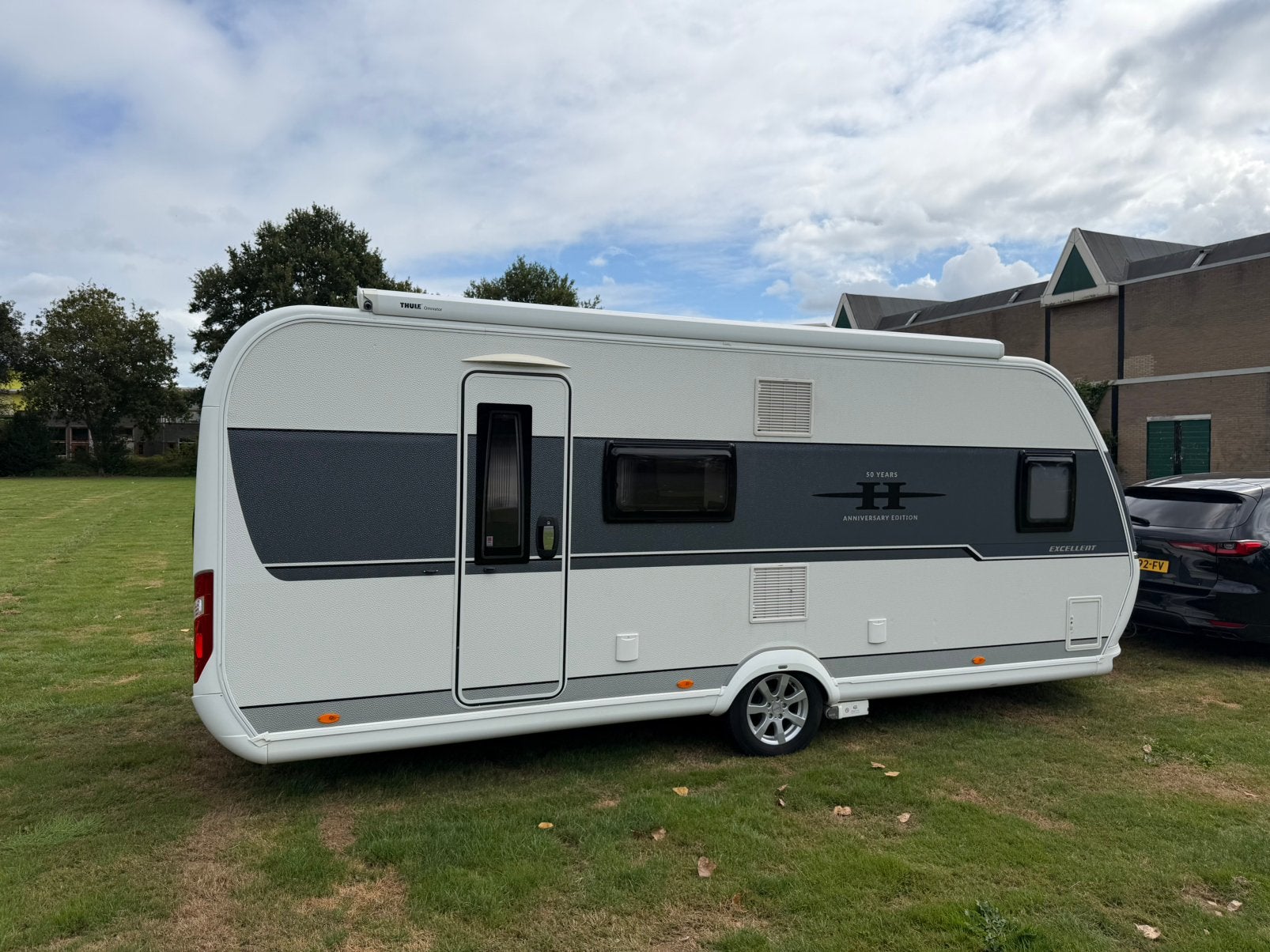 Hobby Excellent 560 KMFe, mover, airco en cassetteluifel, Schokbreker, Rondzit, Hobby, Bedrijf