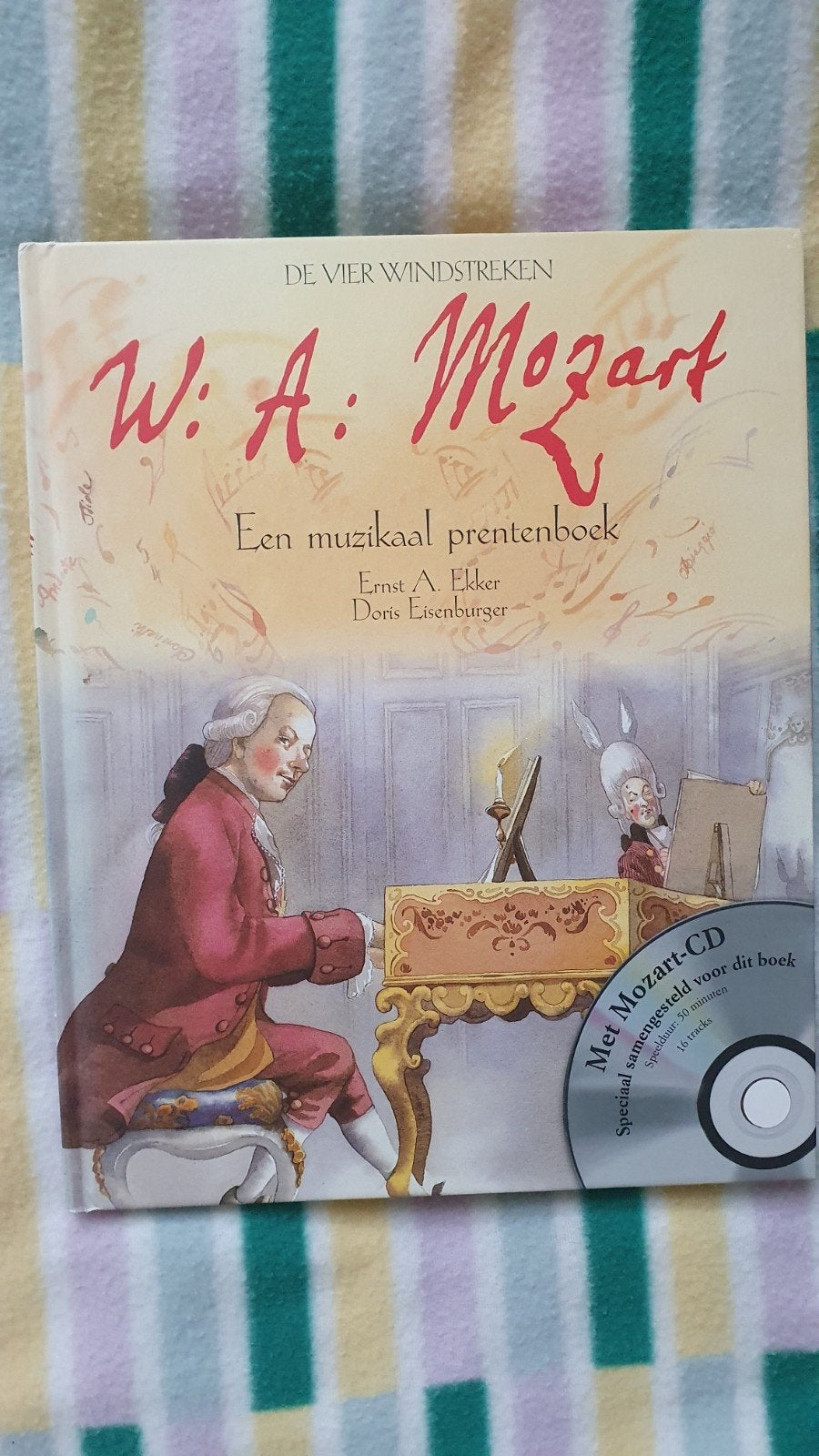 Een muzikaal prentenboek W. Mozart +CD De Vier Windstreken, Ophalen of Verzenden, Zo goed als nieuw