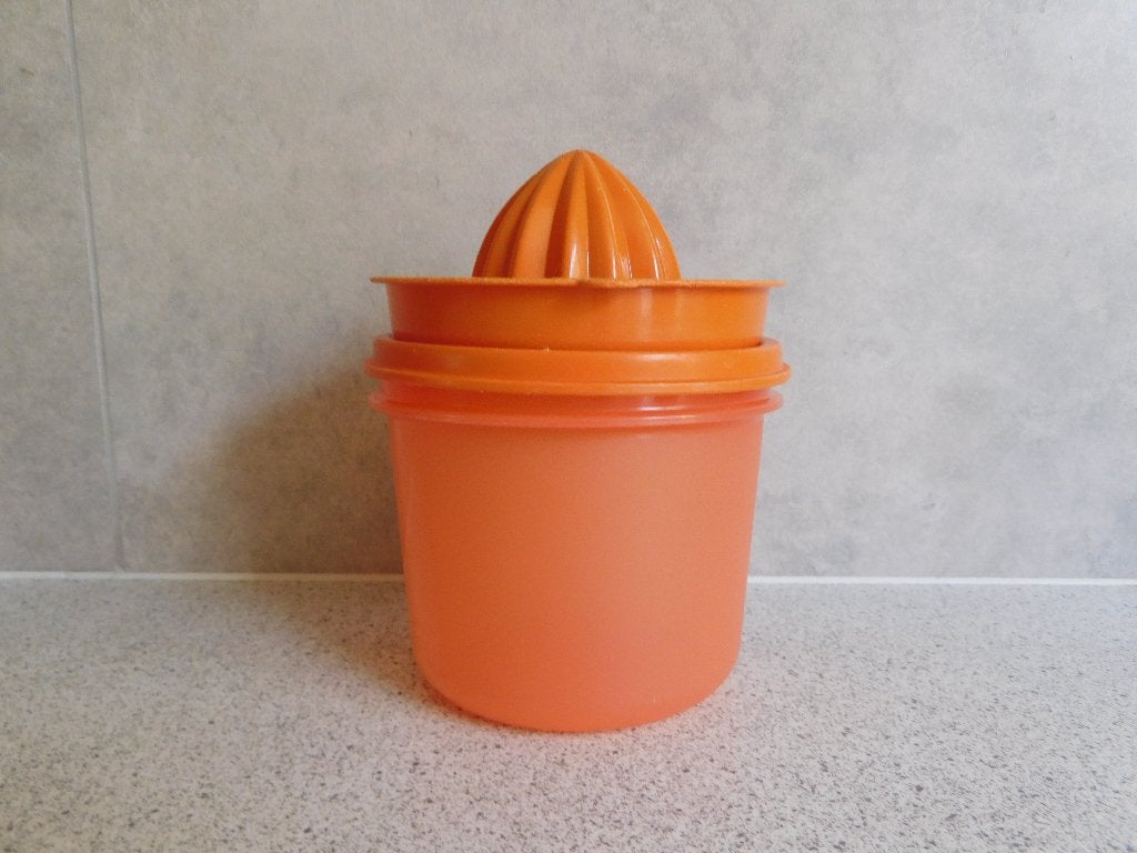 Tupperware Citruspers 550 ml. Oranje, Huis en Inrichting, Keuken | Tupperware, Ophalen of Verzenden, Gebruikt, Oranje, Bus of Trommel