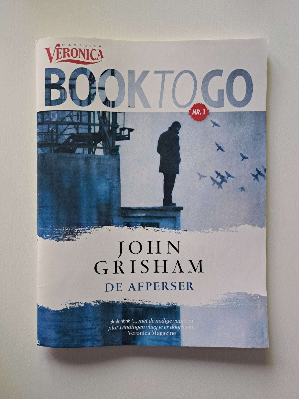 John Grisham - De Afperser (Veronica Magazine Book To Go), Ophalen of Verzenden, Nieuw, John Grisham, Nederland