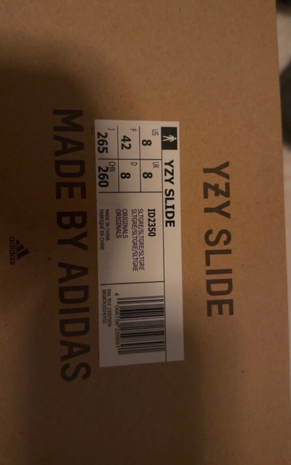 Yeezy Slides – zgan Unisex maat 42 (ik heb normaal 41), Ophalen of Verzenden, Zo goed als nieuw, Grijs, Slippers