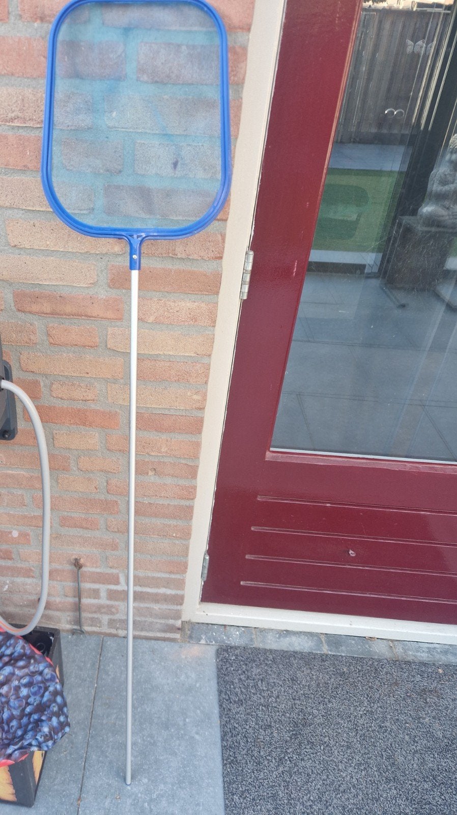 Schepnet voor zwembad, Ophalen
