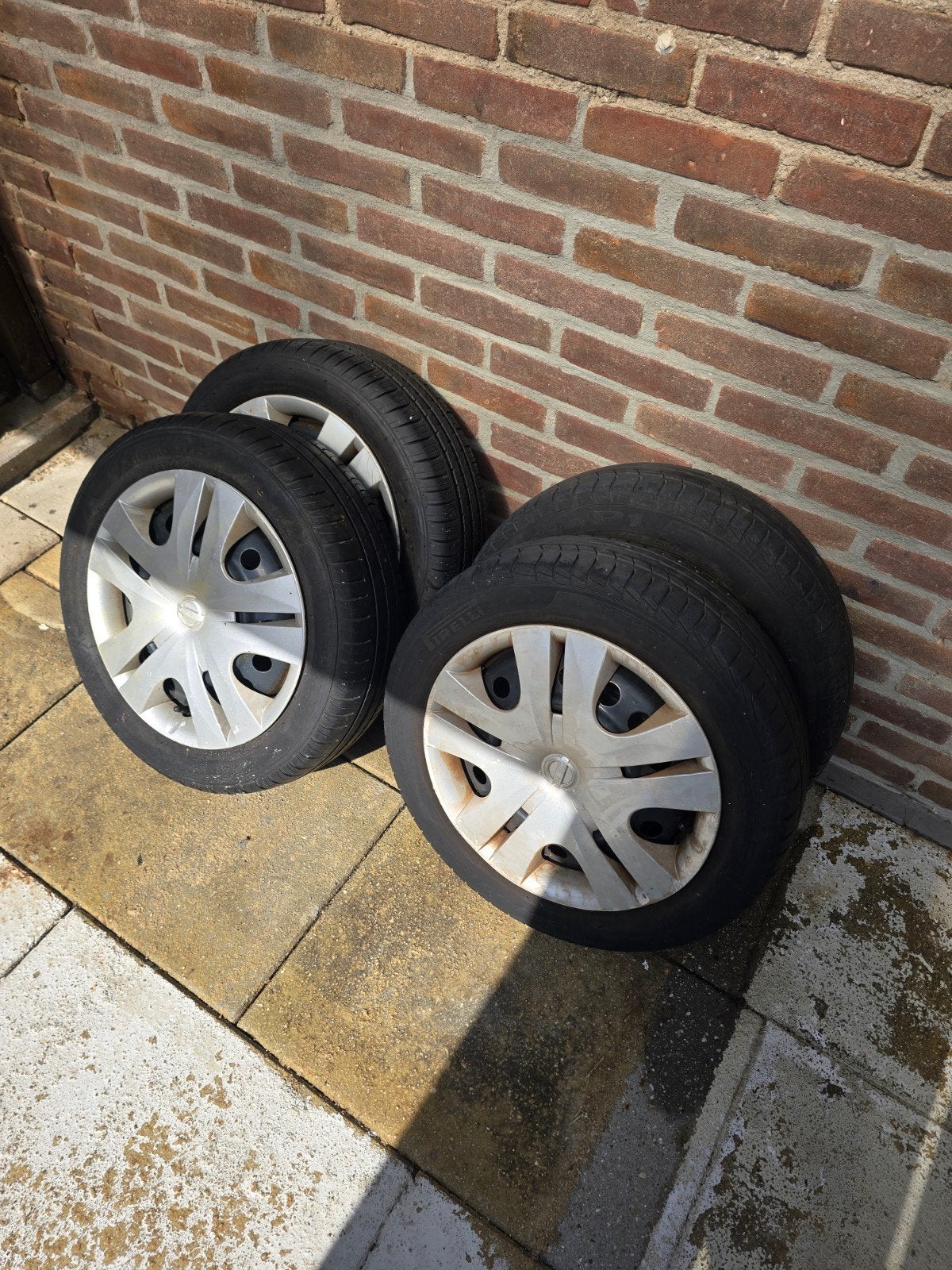 banden met velgen 165/60/14, Ophalen