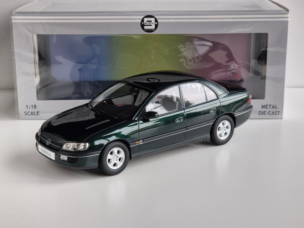 1:18 Triple9 Opel Omega B Jungle Green 1996, Hobby en Vrije tijd, Ophalen of Verzenden, Zo goed als nieuw, Auto, Overige merken