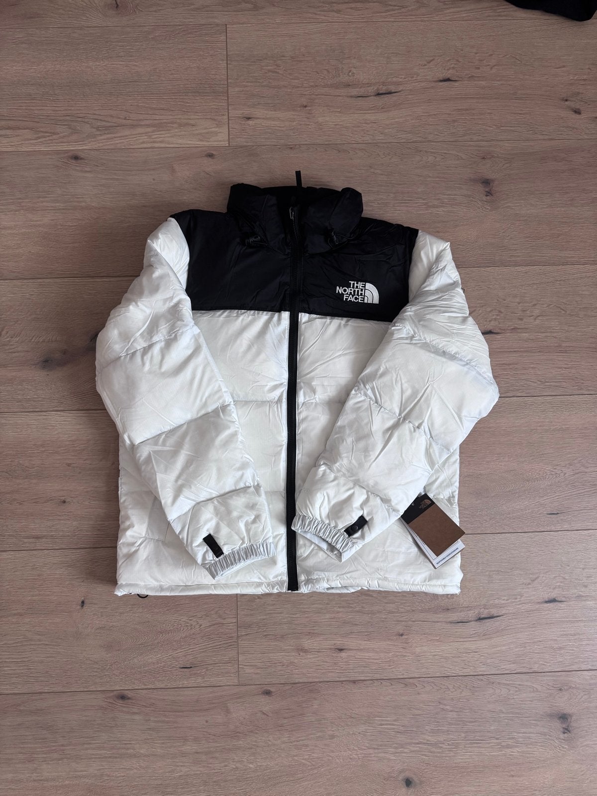 The North Face Puffer Jas Zwart/Wit Maat M, Ophalen of Verzenden, Zo goed als nieuw, Maat 48/50 (M), Wit