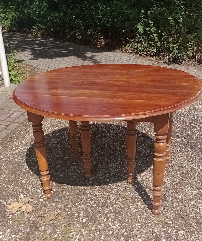 Antieke solide houten uitschuif hangoor eettafel + 2 bladen., Ophalen