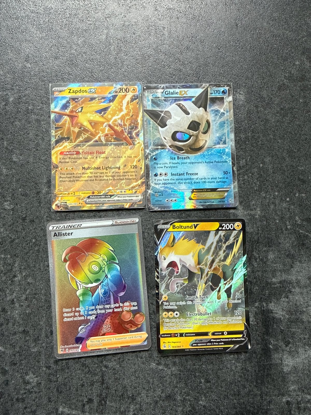 Pokémon Kaarten Bundel: Zapdos, Glalie, Allister, Boltund, Ophalen of Verzenden, Zo goed als nieuw, Meerdere kaarten, Foil
