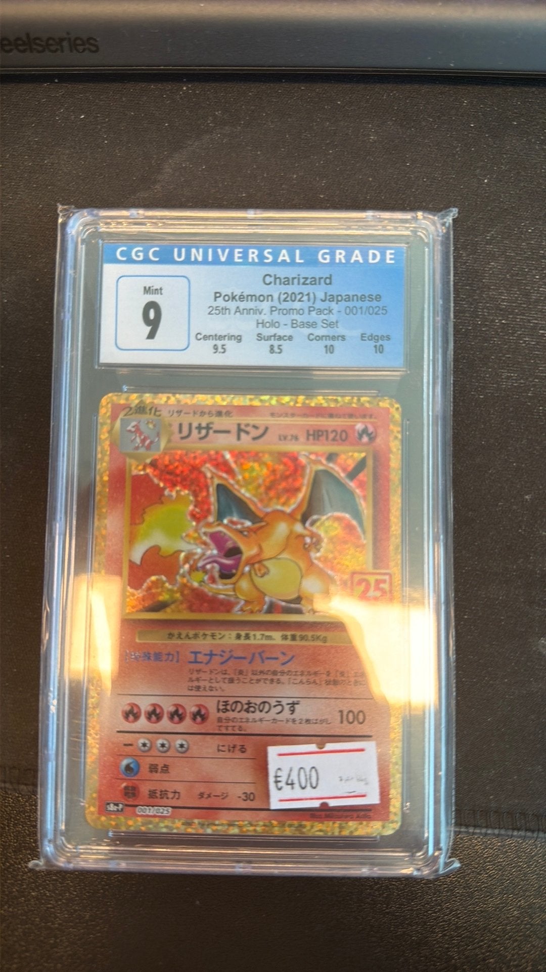 Charizard Holo 25th Anniversary CGC 9 Blue Label, Ophalen of Verzenden, Zo goed als nieuw