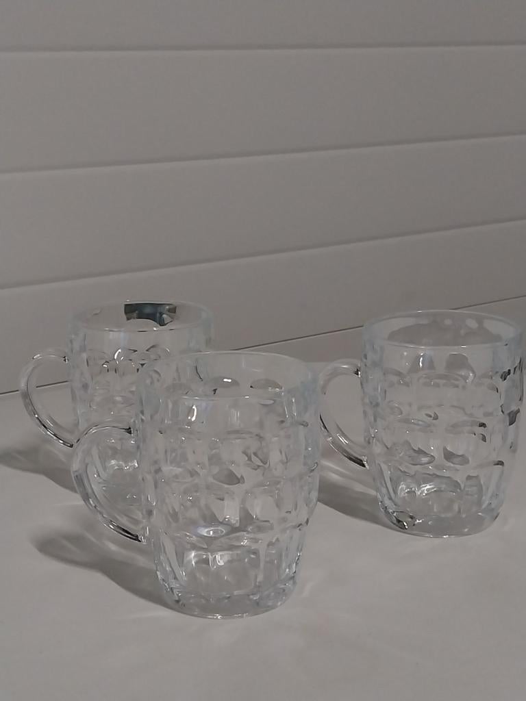 bierpullen in  kratten, Ophalen